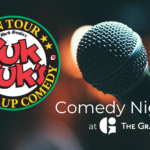 yuk yuks comedy night text on top of a microphone image