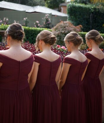 four bridesmaids in burgundy dresses